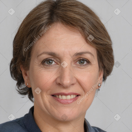 Joyful white adult female with medium  brown hair and brown eyes