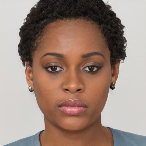 Neutral black young-adult female with short  brown hair and brown eyes