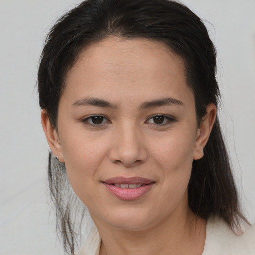 Joyful white young-adult female with medium  brown hair and brown eyes