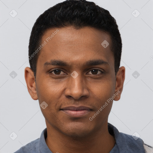 Joyful black young-adult male with short  black hair and brown eyes