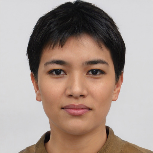 Joyful asian young-adult female with short  black hair and brown eyes