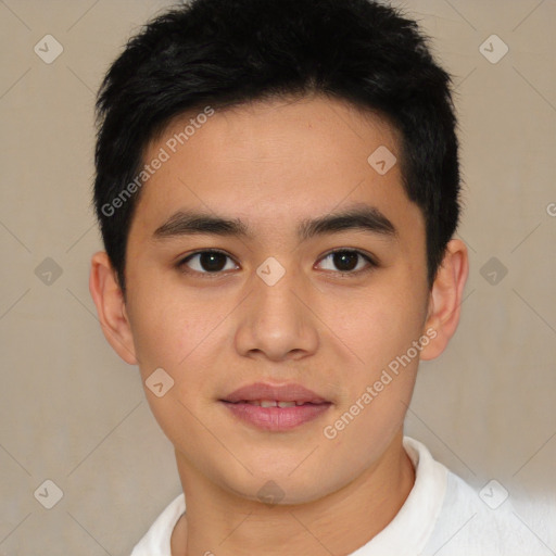 Joyful latino young-adult male with short  black hair and brown eyes