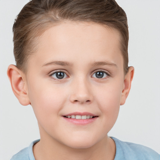 Joyful white child female with short  brown hair and brown eyes