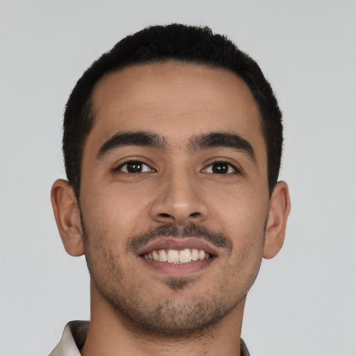 Neutral latino young-adult male with short  black hair and brown eyes