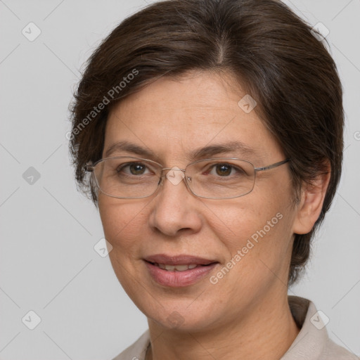 Joyful white adult female with short  brown hair and brown eyes