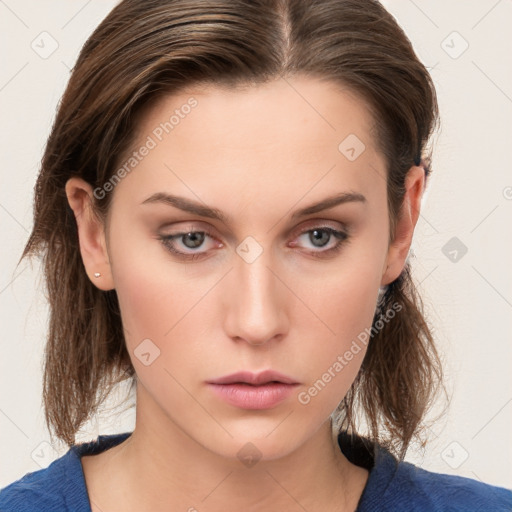 Neutral white young-adult female with medium  brown hair and grey eyes