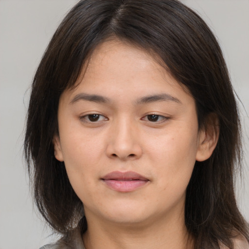 Neutral white young-adult female with medium  brown hair and brown eyes