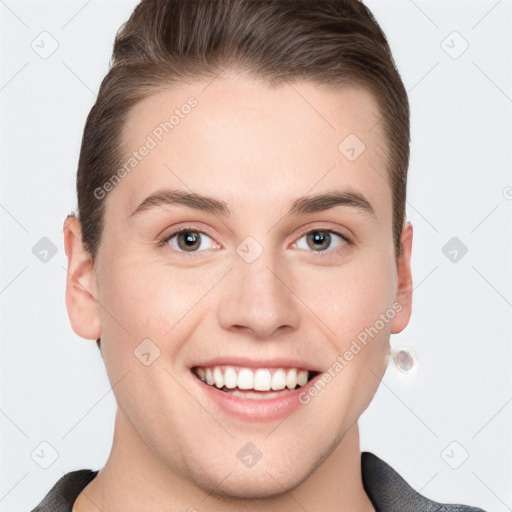 Joyful white young-adult female with short  brown hair and grey eyes