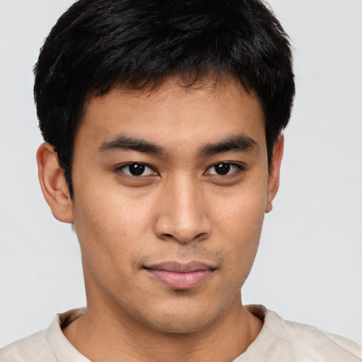 Neutral asian young-adult male with short  brown hair and brown eyes