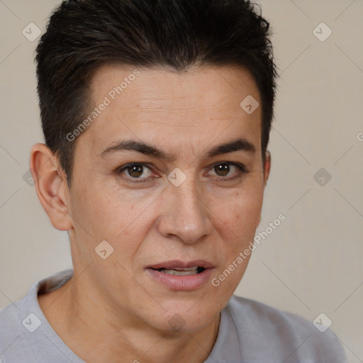 Joyful white adult female with short  brown hair and brown eyes