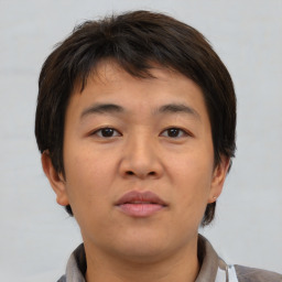 Neutral asian young-adult male with short  brown hair and brown eyes