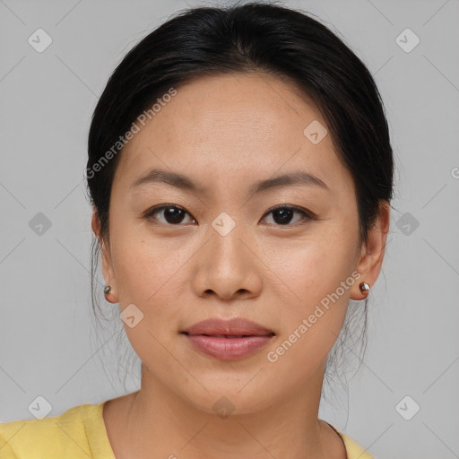 Joyful asian young-adult female with medium  brown hair and brown eyes