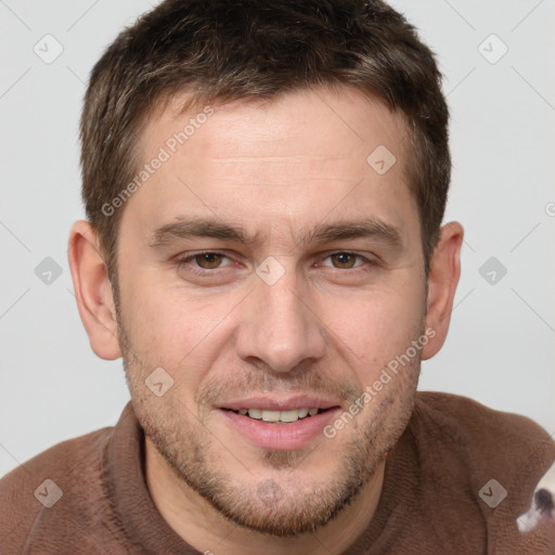 Joyful white young-adult male with short  brown hair and grey eyes