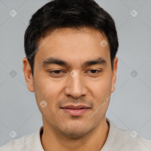 Joyful white young-adult male with short  black hair and brown eyes