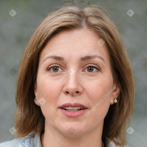 Joyful white adult female with medium  brown hair and brown eyes