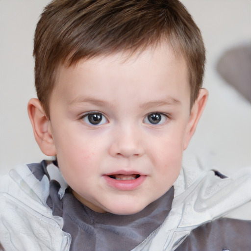 Joyful white child male with short  brown hair and brown eyes