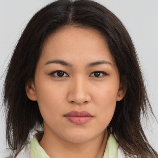 Neutral latino young-adult female with medium  brown hair and brown eyes