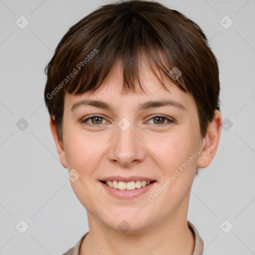 Joyful white young-adult female with short  brown hair and grey eyes