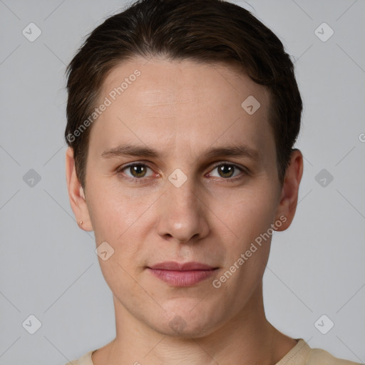 Joyful white young-adult male with short  brown hair and grey eyes