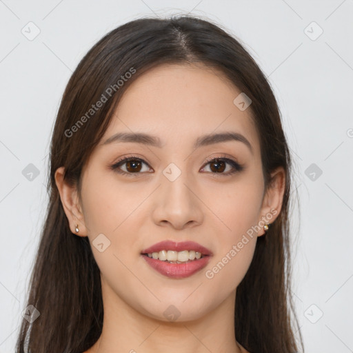 Joyful white young-adult female with long  brown hair and brown eyes