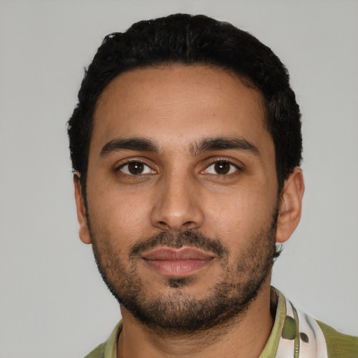 Neutral latino young-adult male with short  black hair and brown eyes