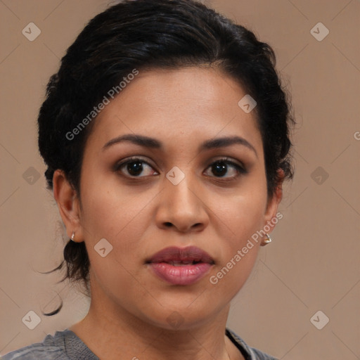 Joyful latino young-adult female with medium  black hair and brown eyes