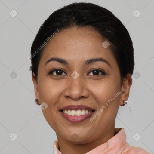 Joyful latino young-adult female with medium  brown hair and brown eyes