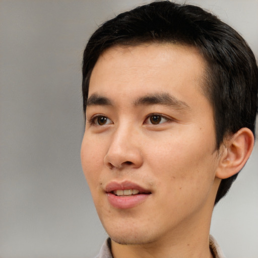 Neutral asian young-adult male with short  black hair and brown eyes
