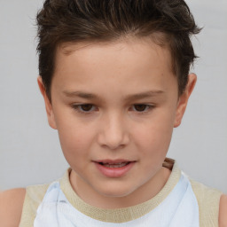 Joyful white child female with short  brown hair and brown eyes