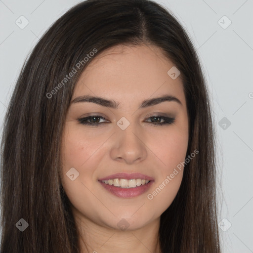 Joyful white young-adult female with long  brown hair and brown eyes