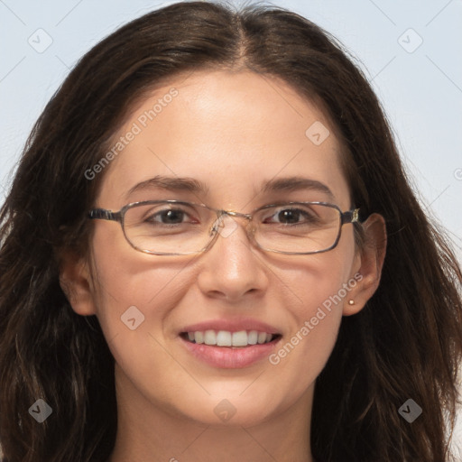 Joyful white adult female with long  brown hair and brown eyes