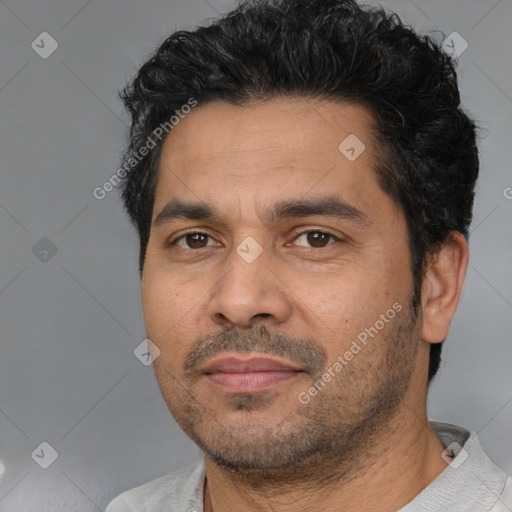 Neutral white adult male with short  black hair and brown eyes