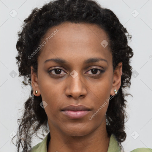 Neutral black young-adult female with short  black hair and brown eyes