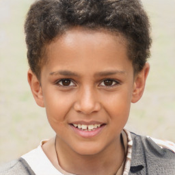 Joyful white child male with short  brown hair and brown eyes