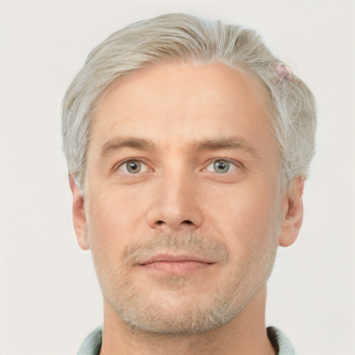 Neutral white adult male with short  blond hair and grey eyes