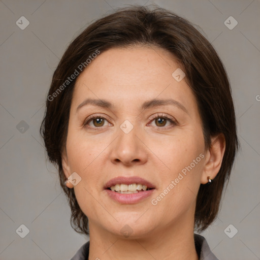 Joyful white adult female with medium  brown hair and brown eyes