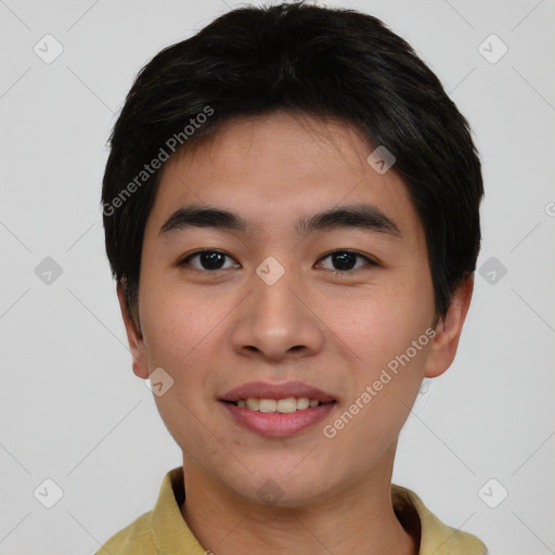 Joyful asian young-adult male with short  black hair and brown eyes