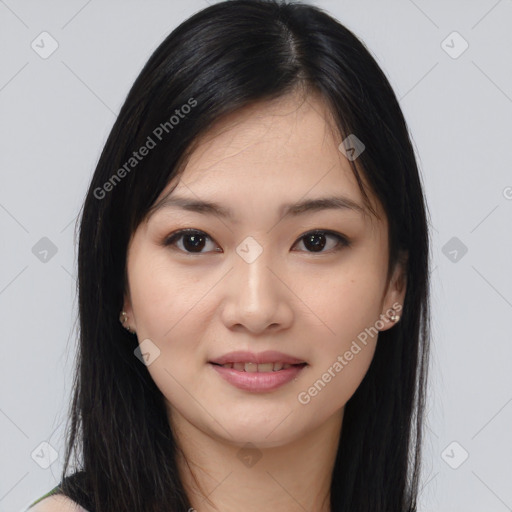 Joyful asian young-adult female with medium  black hair and brown eyes