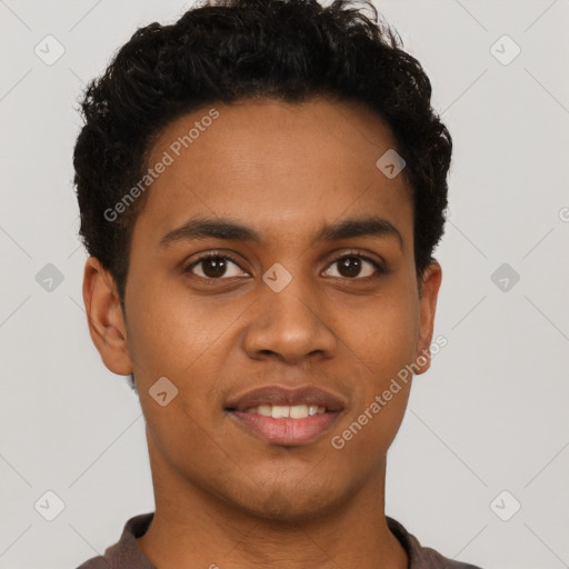 Joyful latino young-adult male with short  brown hair and brown eyes