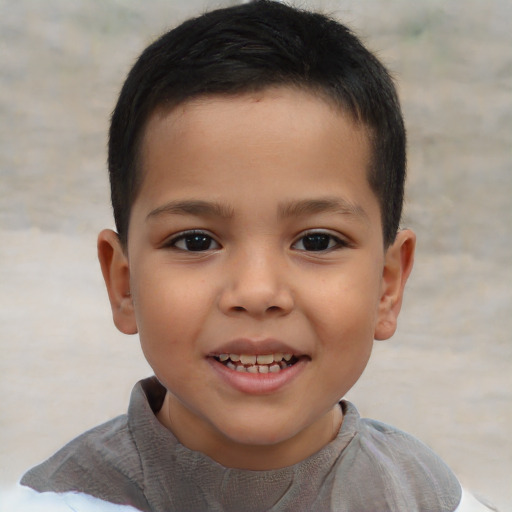 Joyful asian child male with short  brown hair and brown eyes