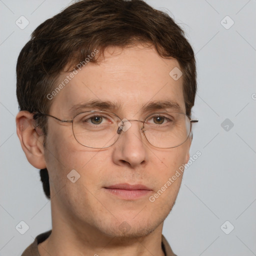 Joyful white adult male with short  brown hair and grey eyes