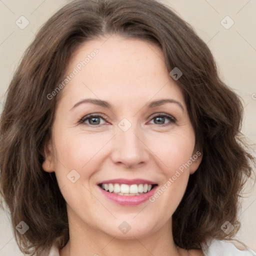 Joyful white young-adult female with medium  brown hair and green eyes