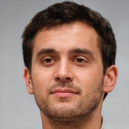Neutral white young-adult male with short  brown hair and brown eyes