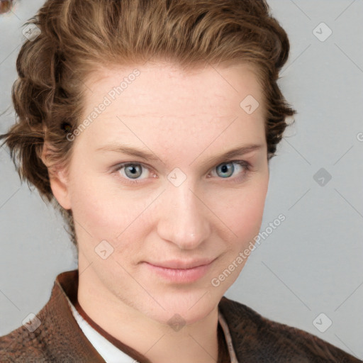 Joyful white young-adult female with short  brown hair and blue eyes