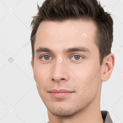 Neutral white young-adult male with short  brown hair and brown eyes