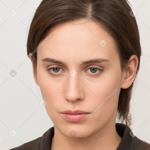 Neutral white young-adult female with medium  brown hair and grey eyes