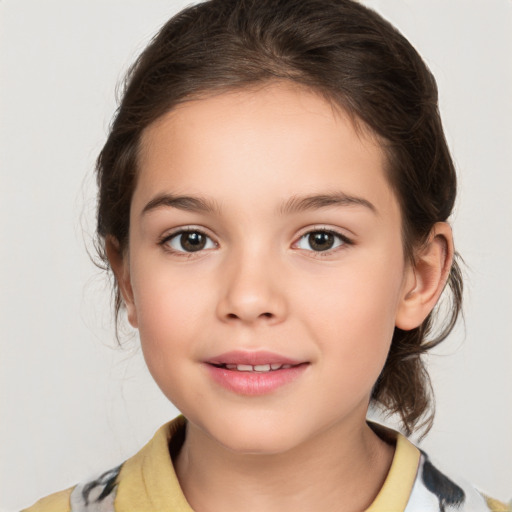 Joyful white child female with medium  brown hair and brown eyes