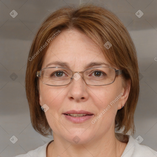 Joyful white adult female with medium  brown hair and blue eyes