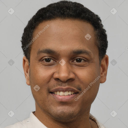 Joyful latino young-adult male with short  brown hair and brown eyes