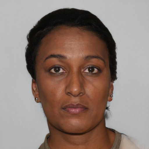 Neutral black young-adult female with short  black hair and brown eyes